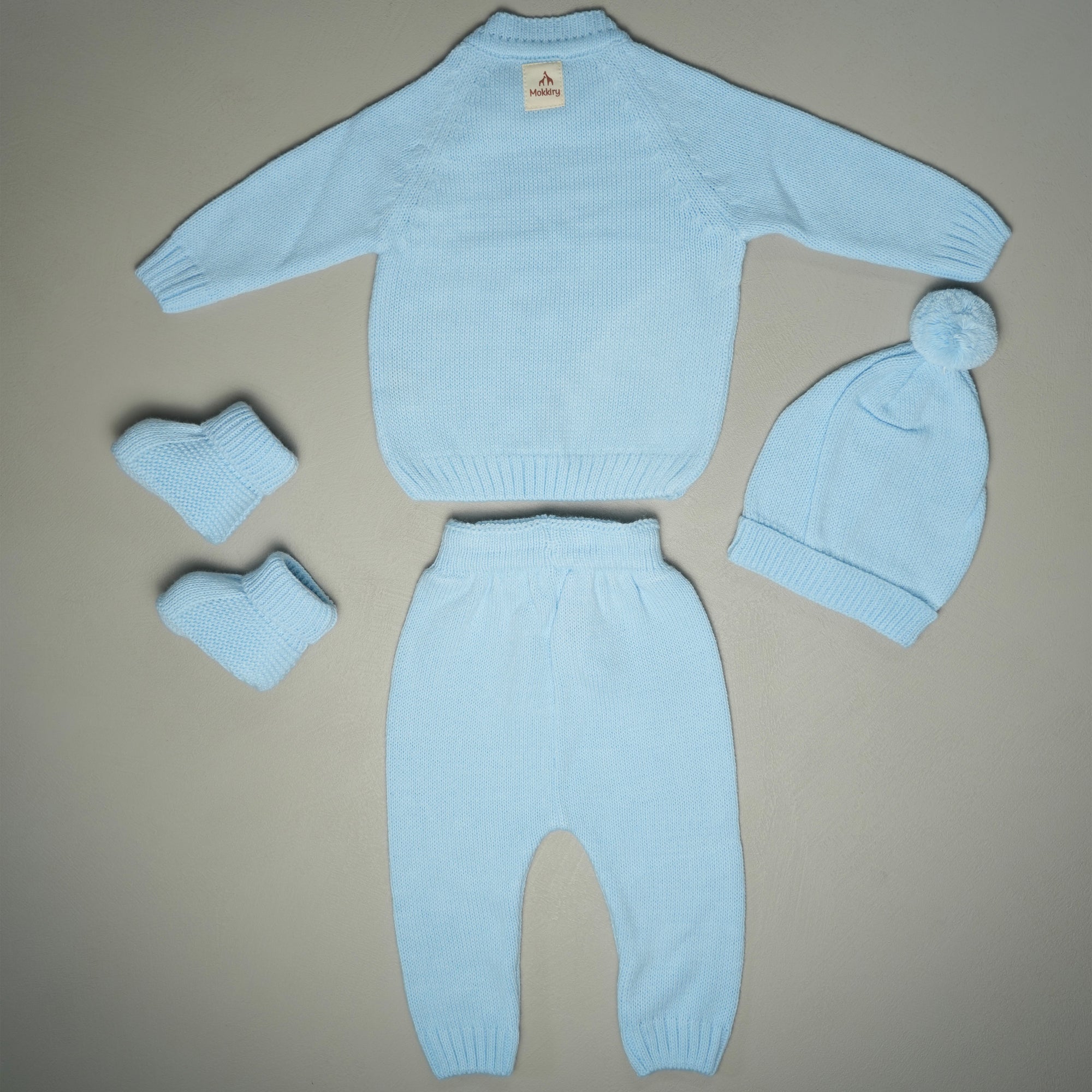 COMPLETINO CAREZZA IN MAGLIA AZZURRO