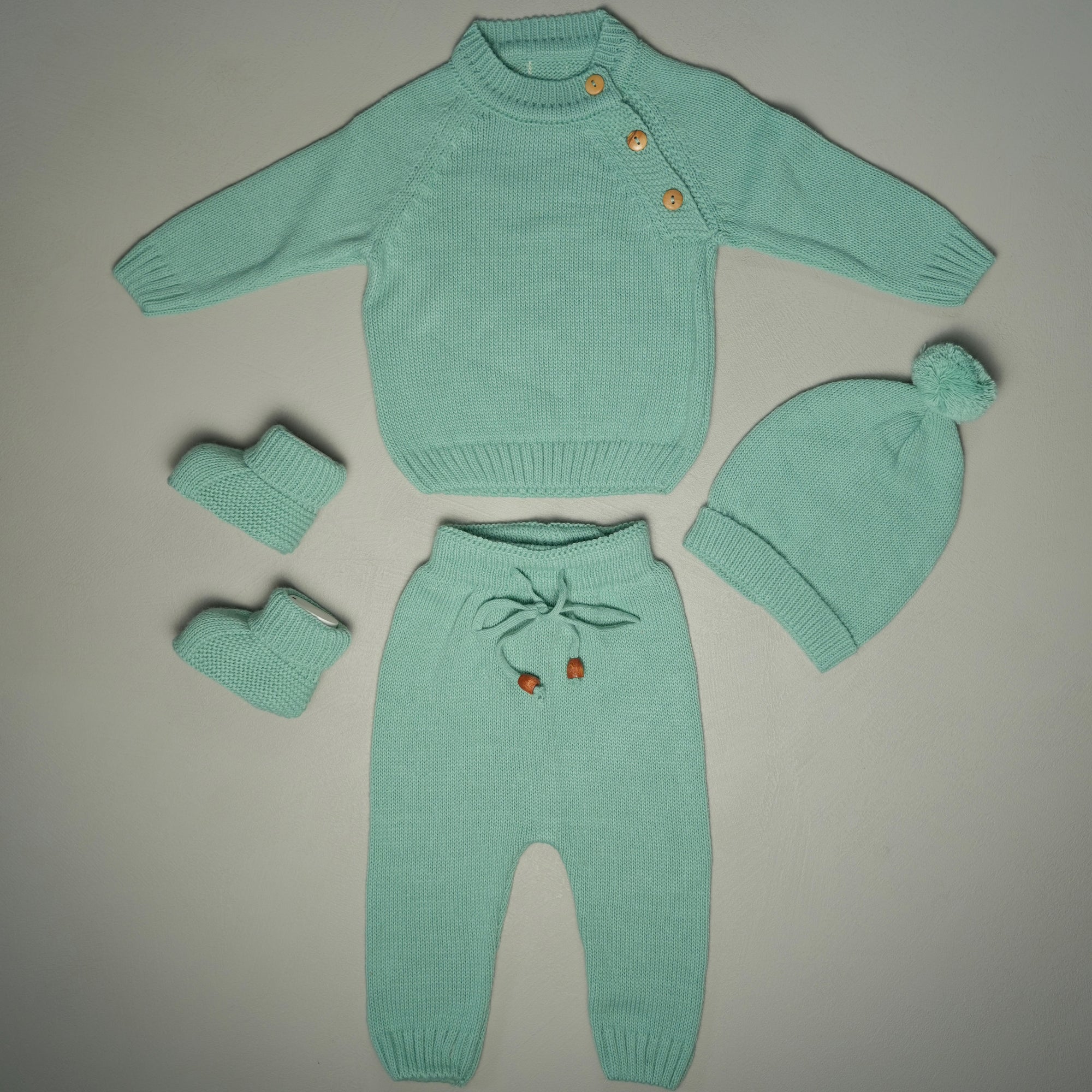 COMPLETINO CAREZZA IN MAGLIA VERDE ACQUA