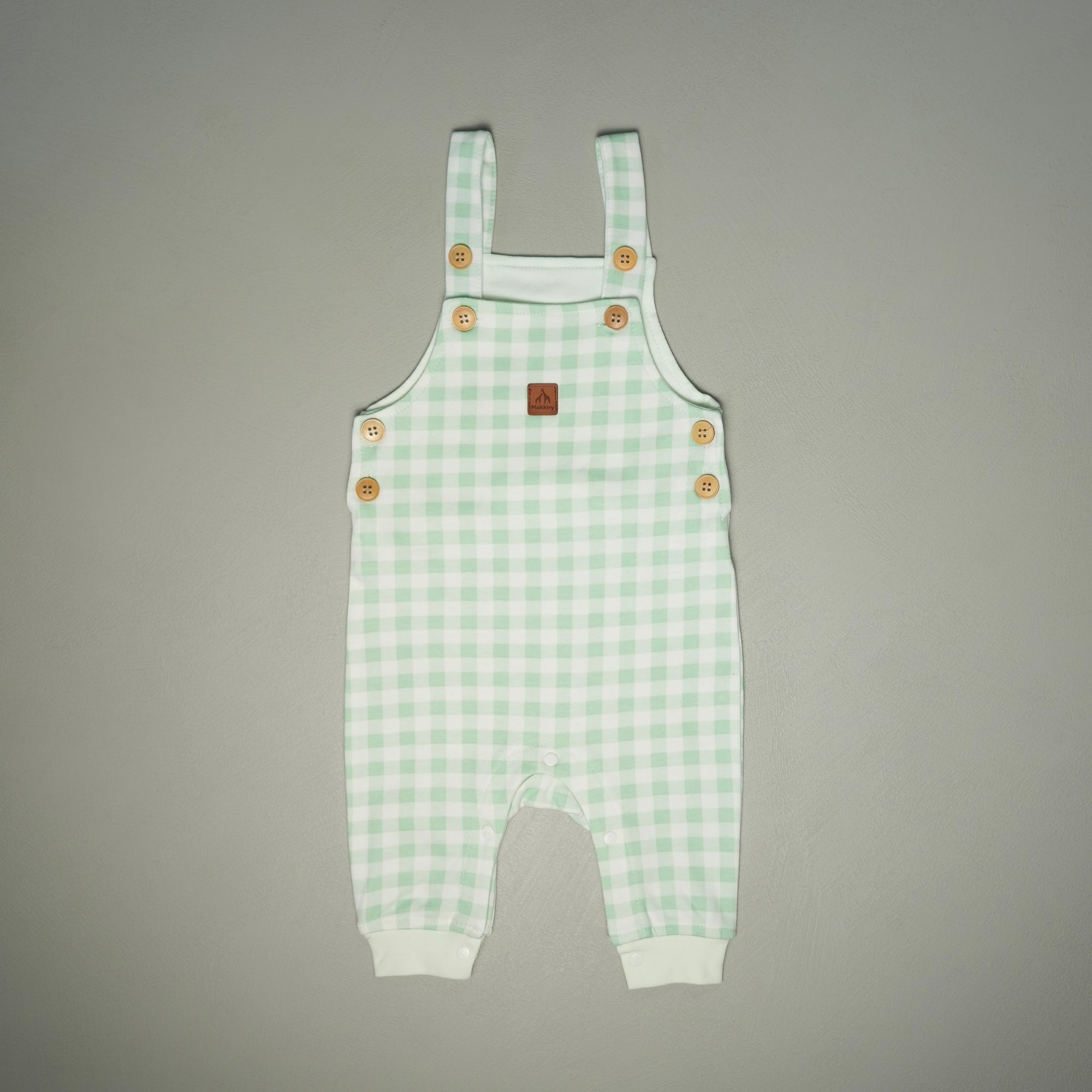 SALOPETTE IN COTONE VERDE CON BODY MANICA LUNGA