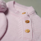 COMPLETINO CAREZZA IN MAGLIA ROSA