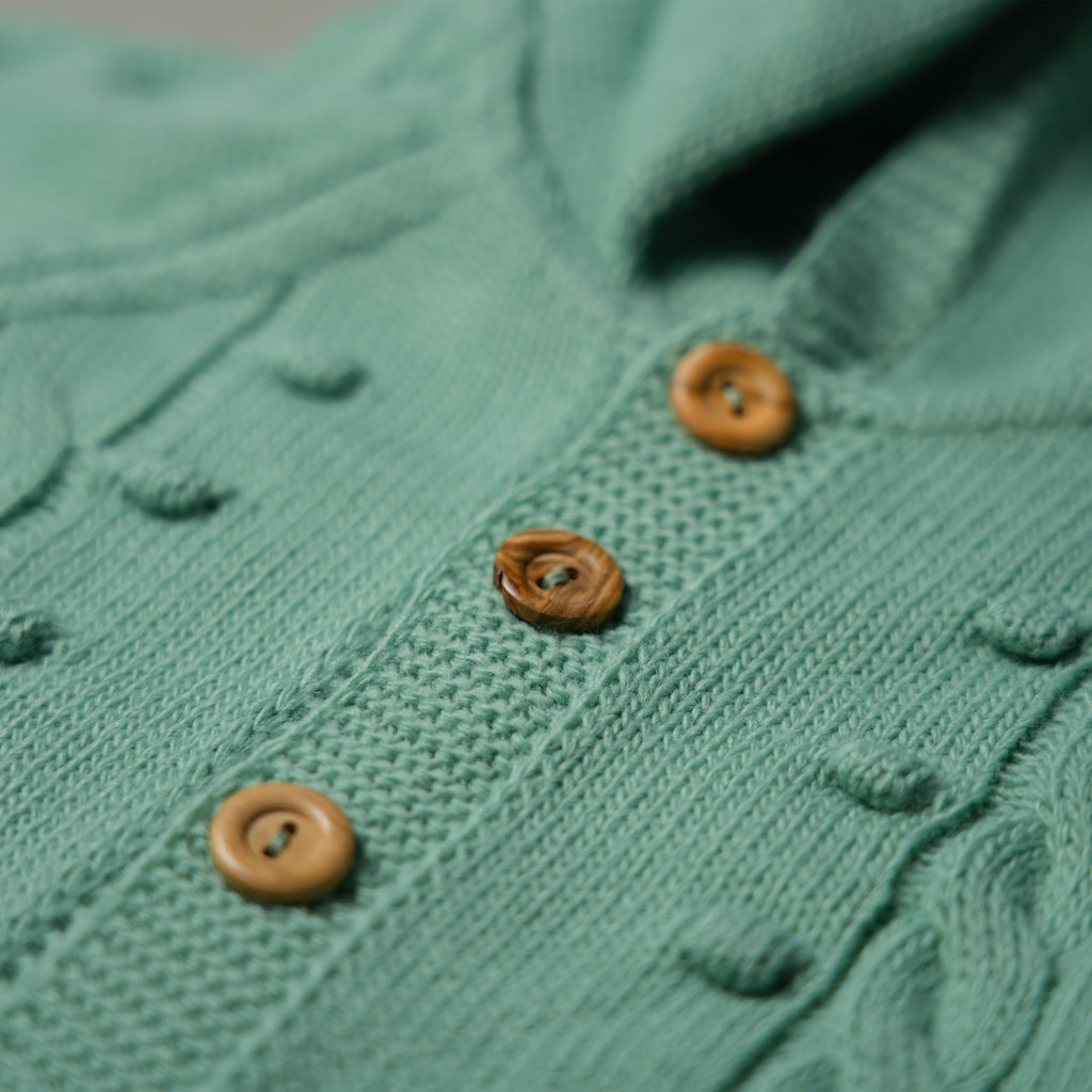 COCCOLA IN MAGLIA VERDE ACQUA CON CAPPUCCIO E BABBUCCE