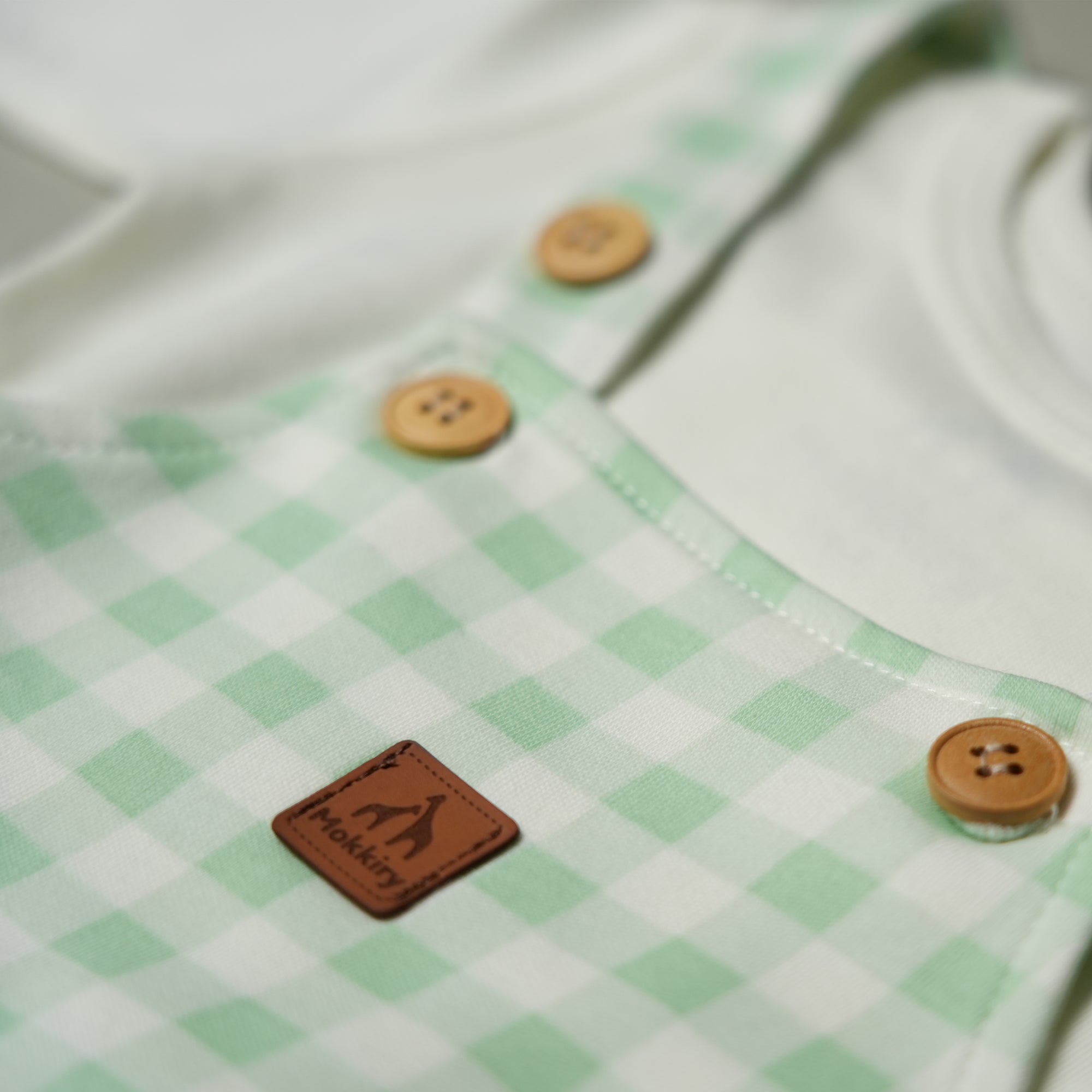 SALOPETTE IN COTONE VERDE CON BODY MANICA LUNGA